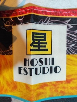 Logo hoshi estudio amarillo